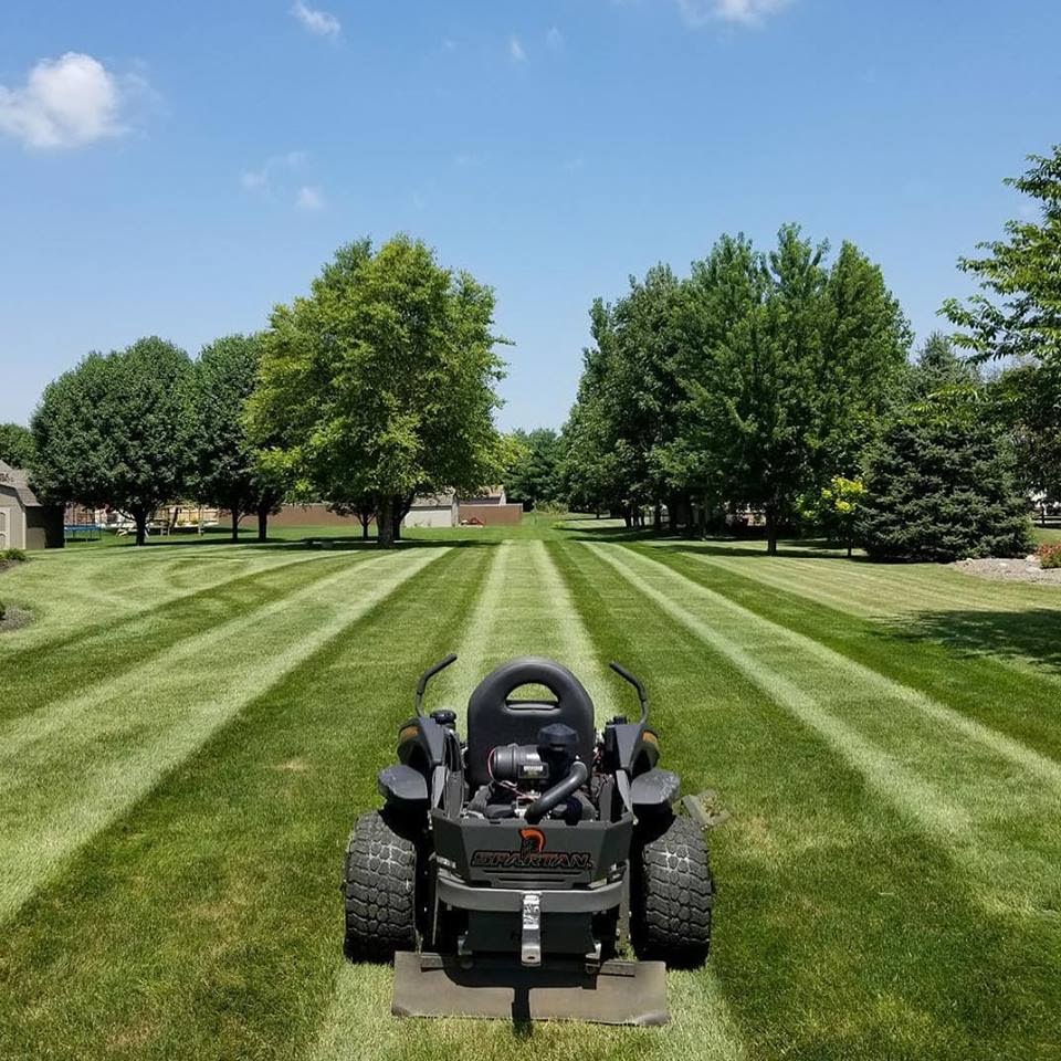 Rear view of Spartan mower striping lawn