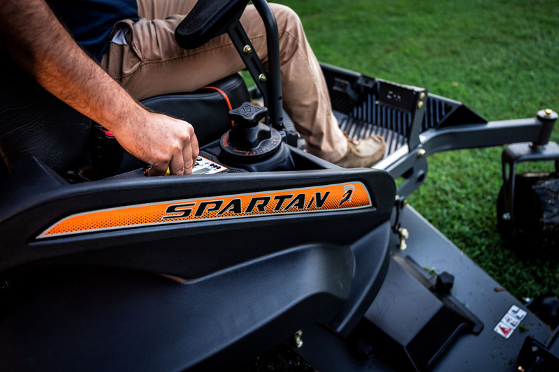 Side panel of mower with spartan decal